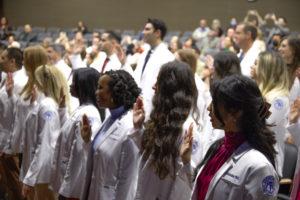 A photo of some of the 50 SCU MSPA students reciting the Physician's Oath during the Spring 2023 MSPA White Coat Ceremony.