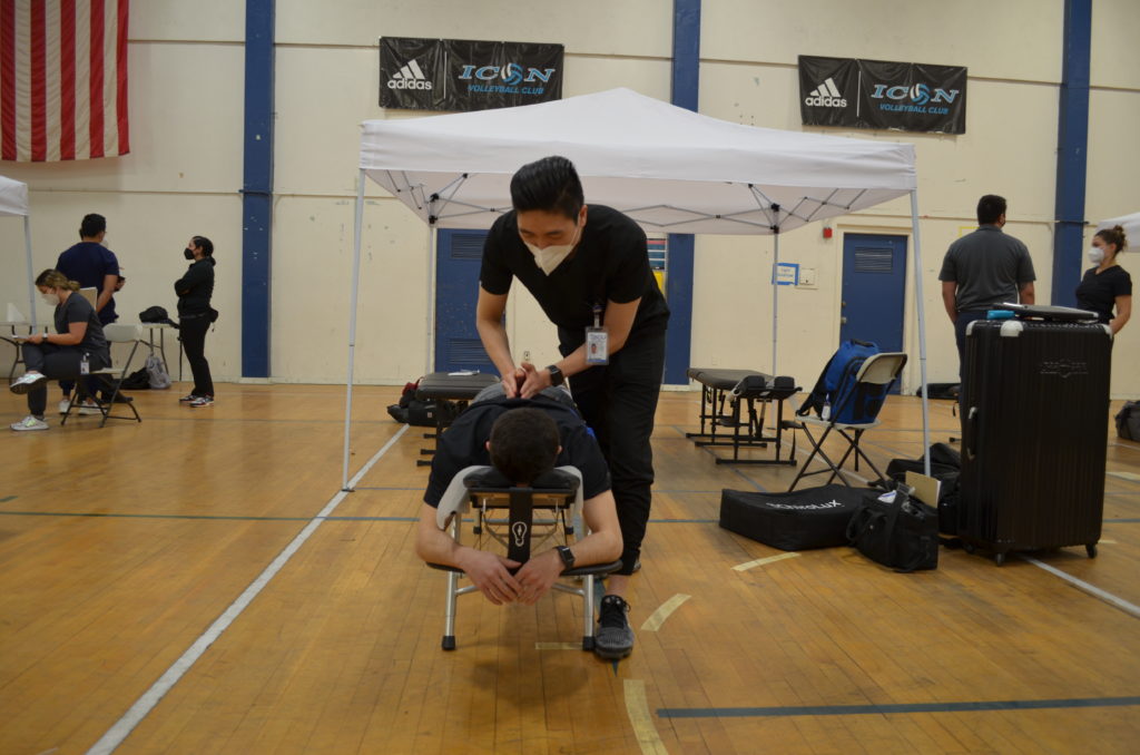 A photo of a patient receiving treatment at the SCU Health Tent Event