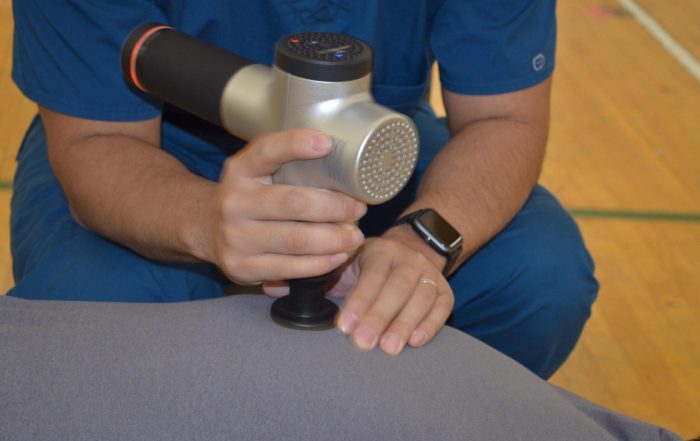 An unidentified patient receives a chiropractic adjustment at a Tent Event free outreach clinic, hosted by SCU Health.
