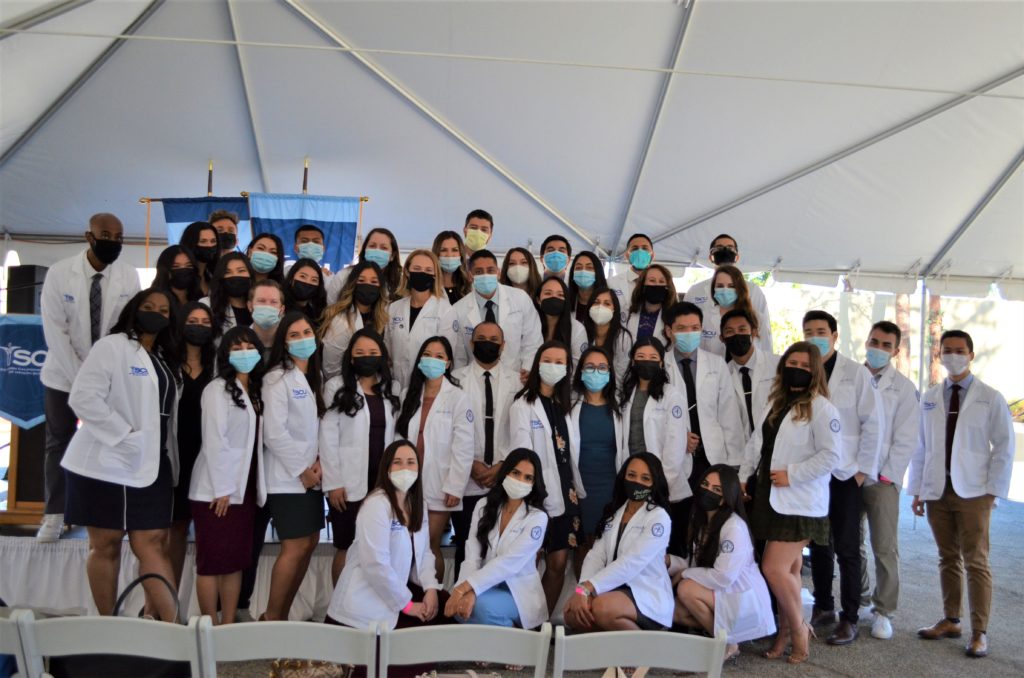 A class photo of the Master of Science Physician Assistant students after receiving their white coats.