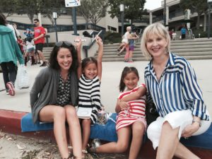 A photo of Dr. Melissa Nagare, her daughters and her mother.