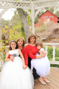 A photo of Dr. Raheleh Khorsan with her mother and her two daughters.