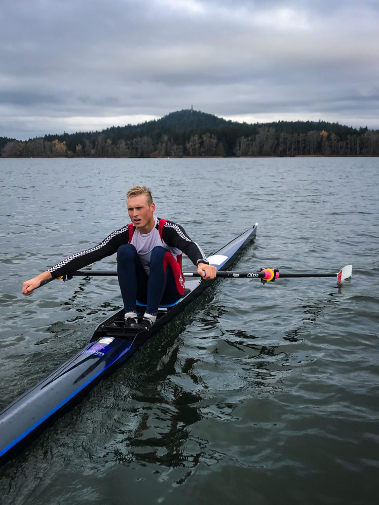 A photo of Tim doing sculling (two-oar) training onElk Lake, Victoria BC, at the nationaltraining center in Canada.