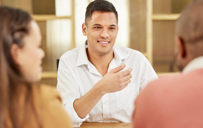 Business man, teamwork and meeting with employees in office for planning, discussion and management.