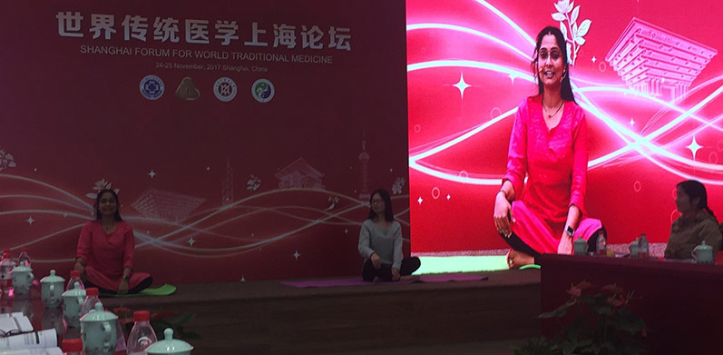 SCU's Dr. Anu Kizhakkeveettil demonstrating yoga