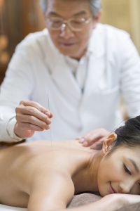 young-woman-receiving-acupuncture-2023-11-27-05-00-35-utc